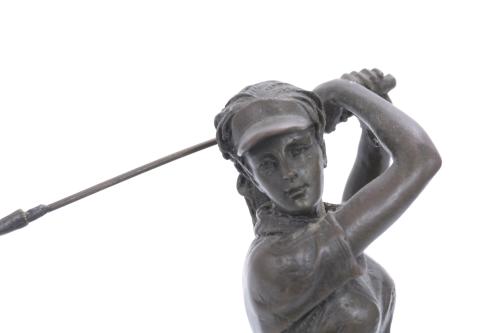 GOLF PLAYER SCULPTURE.