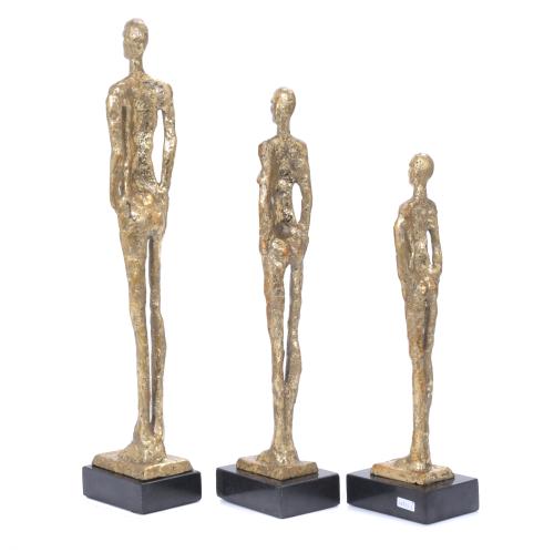 THREE FIGURES AFTER MODELS BY GIACOMETTI.