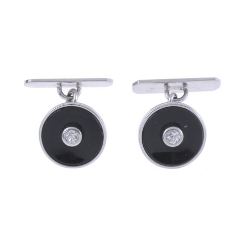 CUFFLINKS WITH DIAMOND.