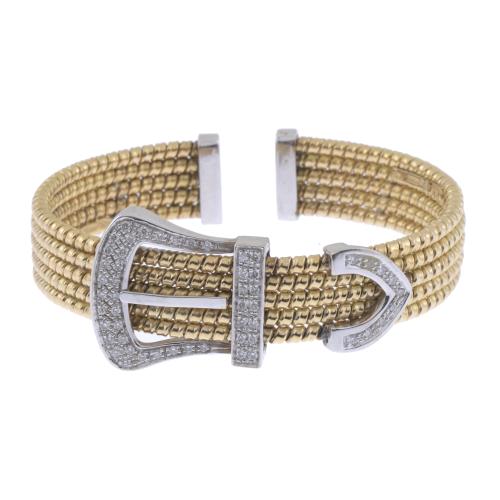 DIAMONDS BANGLE BRACELET IN THE SHAPE OF A BELT.