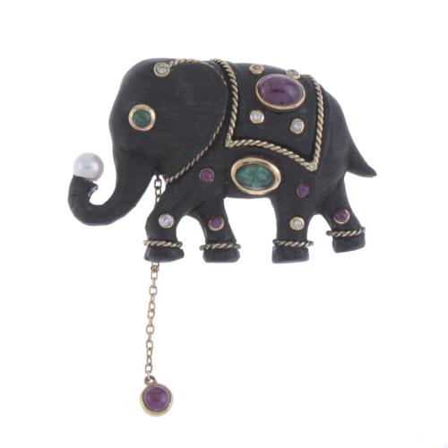 EBONY ELEPHANT-SHAPED BROOCH WITH RHINESTONES.