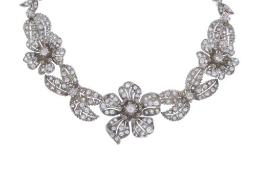 ATTR. TO MELLERIO, CIRCA 1905. TRANSFORMABLE FLORAL CHOKER.