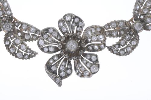 ATTR. TO MELLERIO, CIRCA 1905. TRANSFORMABLE FLORAL CHOKER.