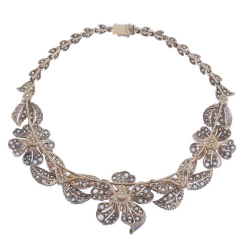 ATTR. TO MELLERIO, CIRCA 1905. TRANSFORMABLE FLORAL CHOKER.