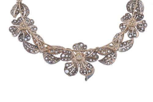 ATTR. TO MELLERIO, CIRCA 1905. TRANSFORMABLE FLORAL CHOKER.