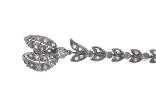 ATTR. TO MELLERIO, CIRCA 1905. TRANSFORMABLE FLORAL CHOKER.