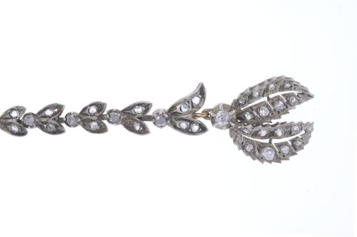 ATTR. TO MELLERIO, CIRCA 1905. TRANSFORMABLE FLORAL CHOKER.