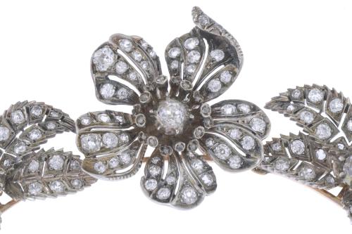 ATTR. TO MELLERIO, CIRCA 1905. TRANSFORMABLE FLORAL CHOKER.