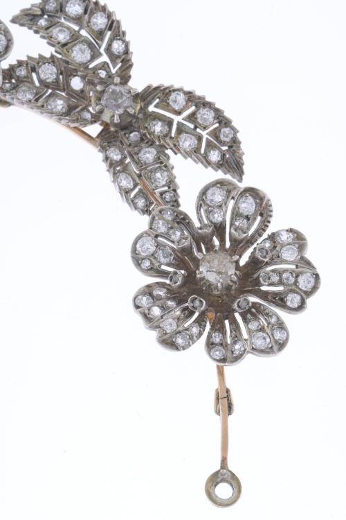 ATTR. TO MELLERIO, CIRCA 1905. TRANSFORMABLE FLORAL CHOKER.