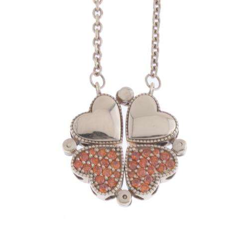 CLOVER-SHAPED PENDANT MOUNTED WITH PARTS OF HEARTS. 