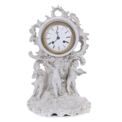 536-BISCUIT PORCELAIN TABLE CLOCK, FIRST HALF OF THE 20TH CENTURY. 