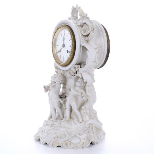 BISCUIT PORCELAIN TABLE CLOCK, FIRST HALF OF THE 20TH CENTU