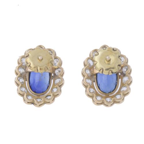 SAPPHIRES AND DIAMONDS ROSETTE EARRINGS, CIRCA 1950.