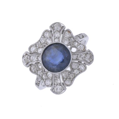 71-ART DECO ROSETTE RING WITH SAPPHIRE AND DIAMONDS.