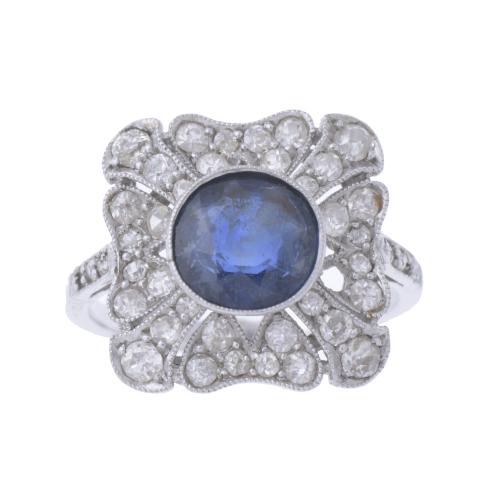 ART DECO ROSETTE RING WITH SAPPHIRE AND DIAMONDS.