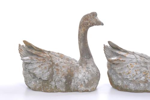 PAIR OF GARDEN FIGURES IN THE SHAPE OF SWANS.