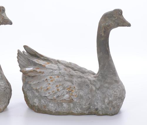 PAIR OF GARDEN FIGURES IN THE SHAPE OF SWANS.