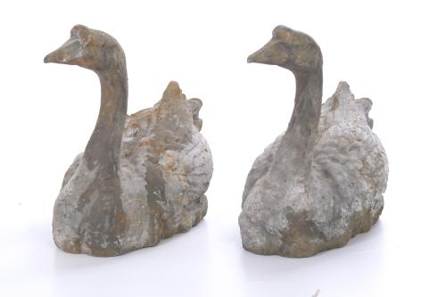 PAIR OF GARDEN FIGURES IN THE SHAPE OF SWANS.