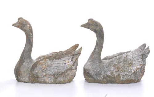 PAIR OF GARDEN FIGURES IN THE SHAPE OF SWANS.