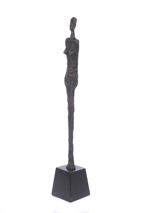 AFTER MODELS BY ALBERTO GIACOMETTI (1901 - 1966). "WOMAN".