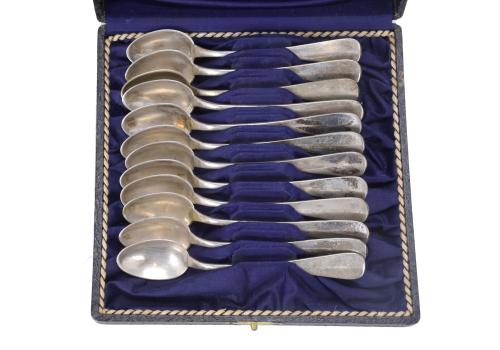 SET OF TWO LOTS OF SILVER TEASPOONS.