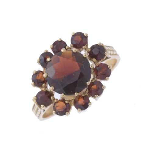 90-GARNETS ROSETTE RING.