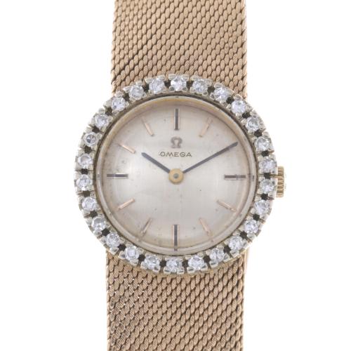 356-OMEGA. GOLD AND DIAMONDS WATCH.