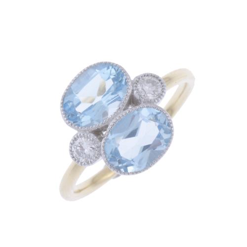 27-ART DECO STYLE RING WITH BLUE TOPAZES AND DIAMONDS