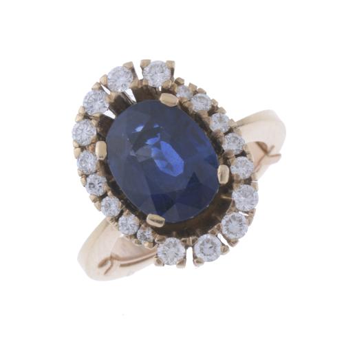 36-ROSETTE RING WITH SAPPHIRE AND DIAMONDS. 