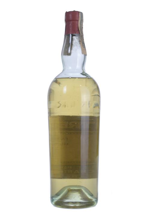 CHARTREUSE. BOTELLA DE LICOR AMARILLO, 1959 - 1965.