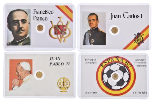 Cuatro monedas de 100 ptas conmemorativas.