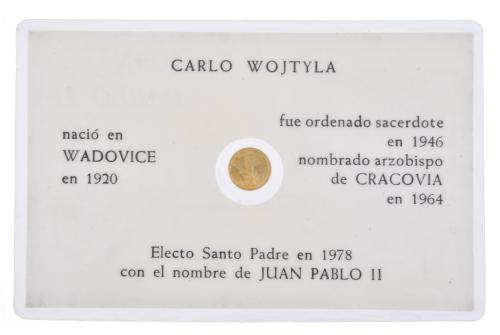 Cuatro monedas de 100 ptas conmemorativas.