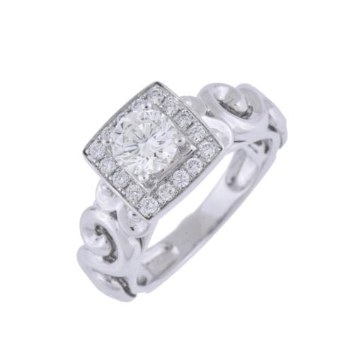 Anillo rosetón cuadrado con diamantes, el central de 0.65ct.