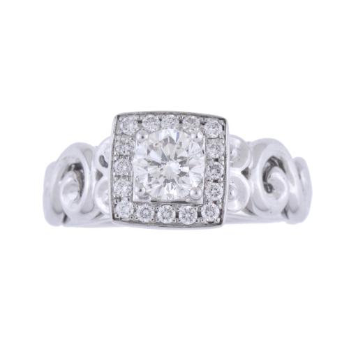 Anillo rosetón cuadrado con diamantes, el central de 0.65ct.