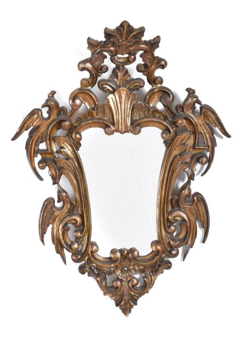 Pair of Elizabethan style ornamental mirrors, mid 20th cent