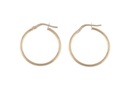 Gold creole earrings.