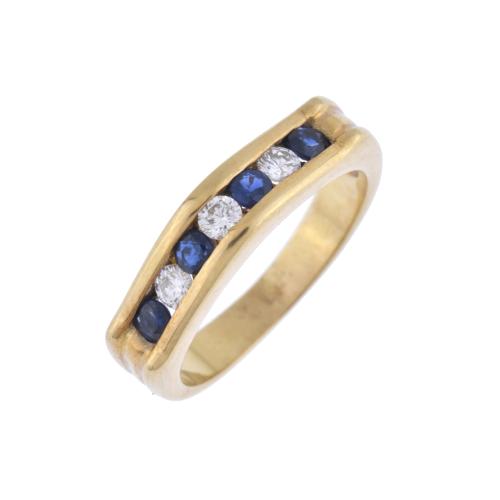 Sapphires and diamonds wedding ring.