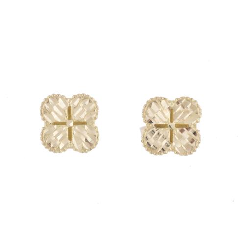 After VAN CLEEF models, 'Alhambra' earrings.