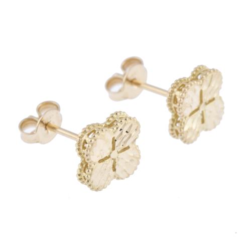 After VAN CLEEF models, &#39;Alhambra&#39; earrings.