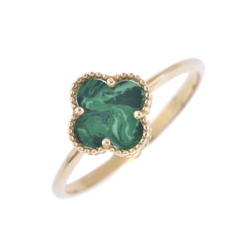 After VAN CLEEF models. 'Alhambra' ring with malachite.