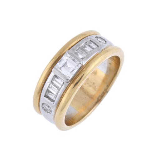 Ring with diamonds and two-tone gold.