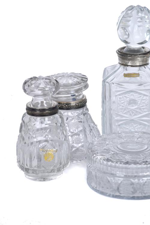 Set of five decanters and an ashtray, 20th century.