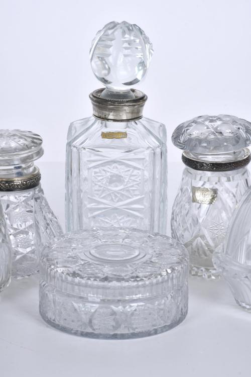 Set of five decanters and an ashtray, 20th century.