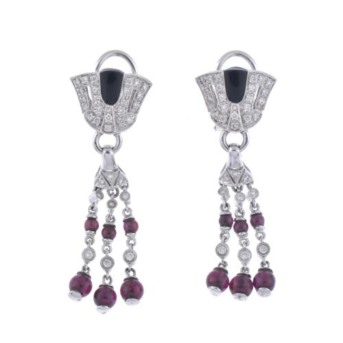 Long earrings with garnets, onyx and diamonds.