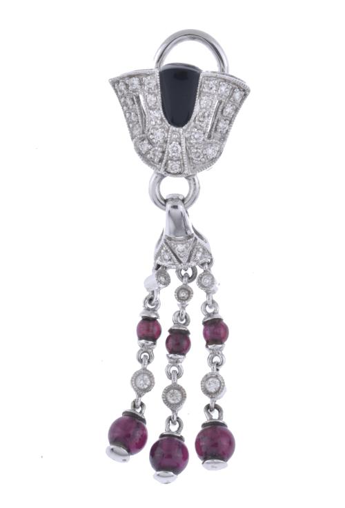 Long earrings with garnets, onyx and diamonds.